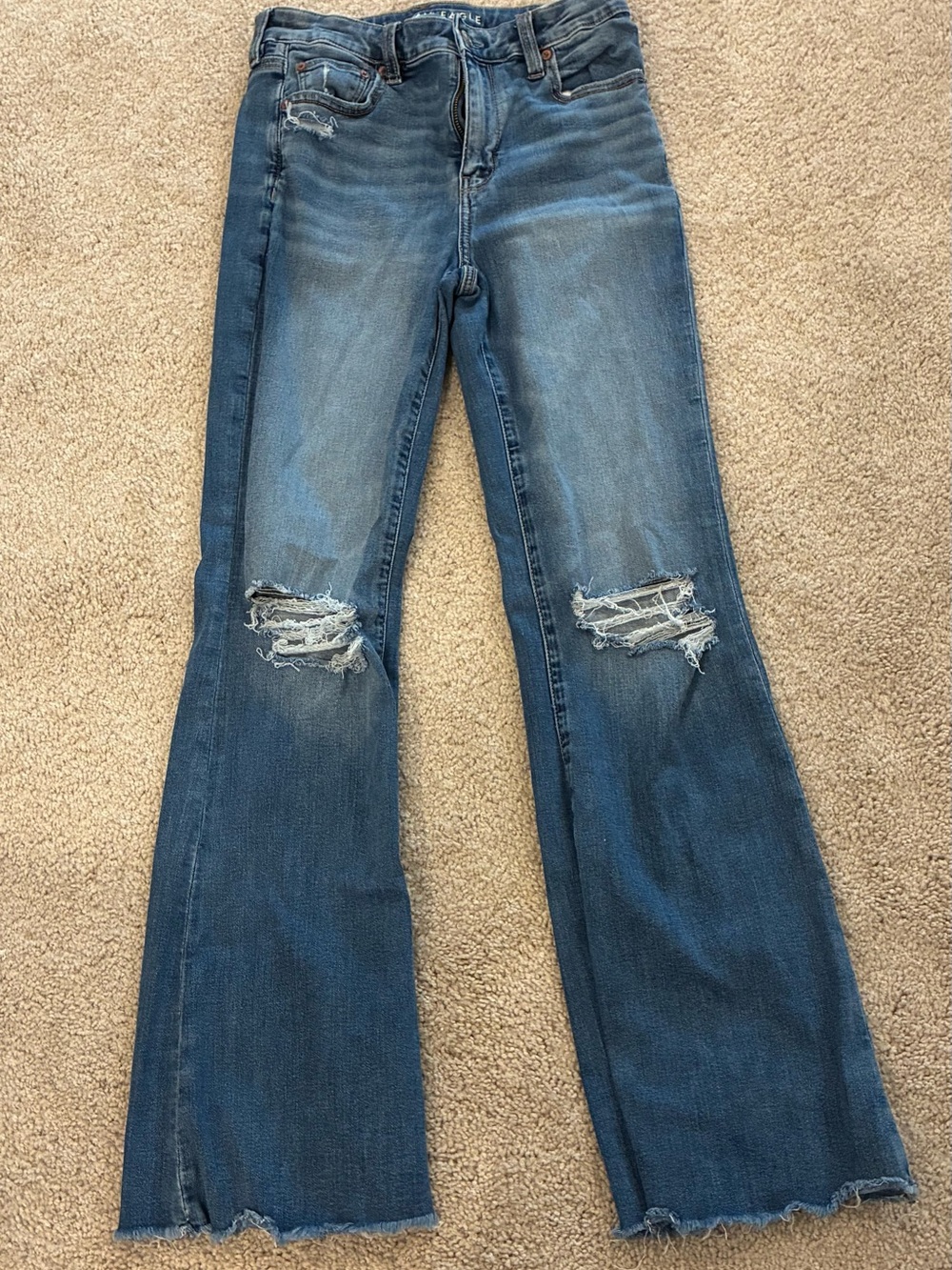 American Eagle Super High Rise Flare Jeans 4 Regular Distressed Raw Hem